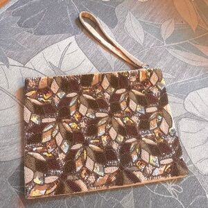 Agra beaded sequin clutch bag by SEZANE